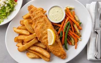 Cod filet prepared English style, served with tartar sauce