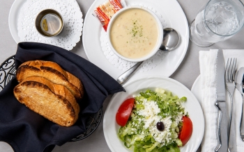 Soup du Jour meal setting with soup and salad